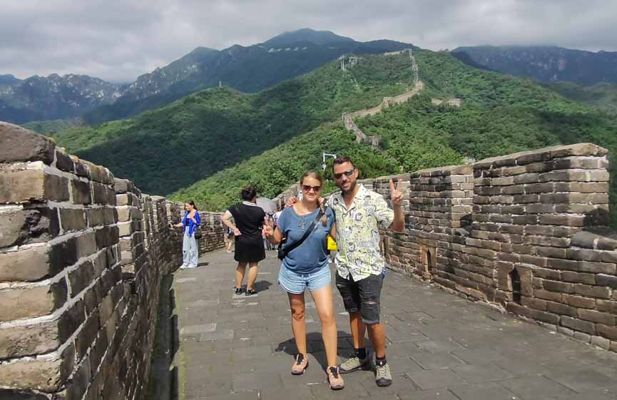 voyageurs sur la grande muraille de Mutianyu